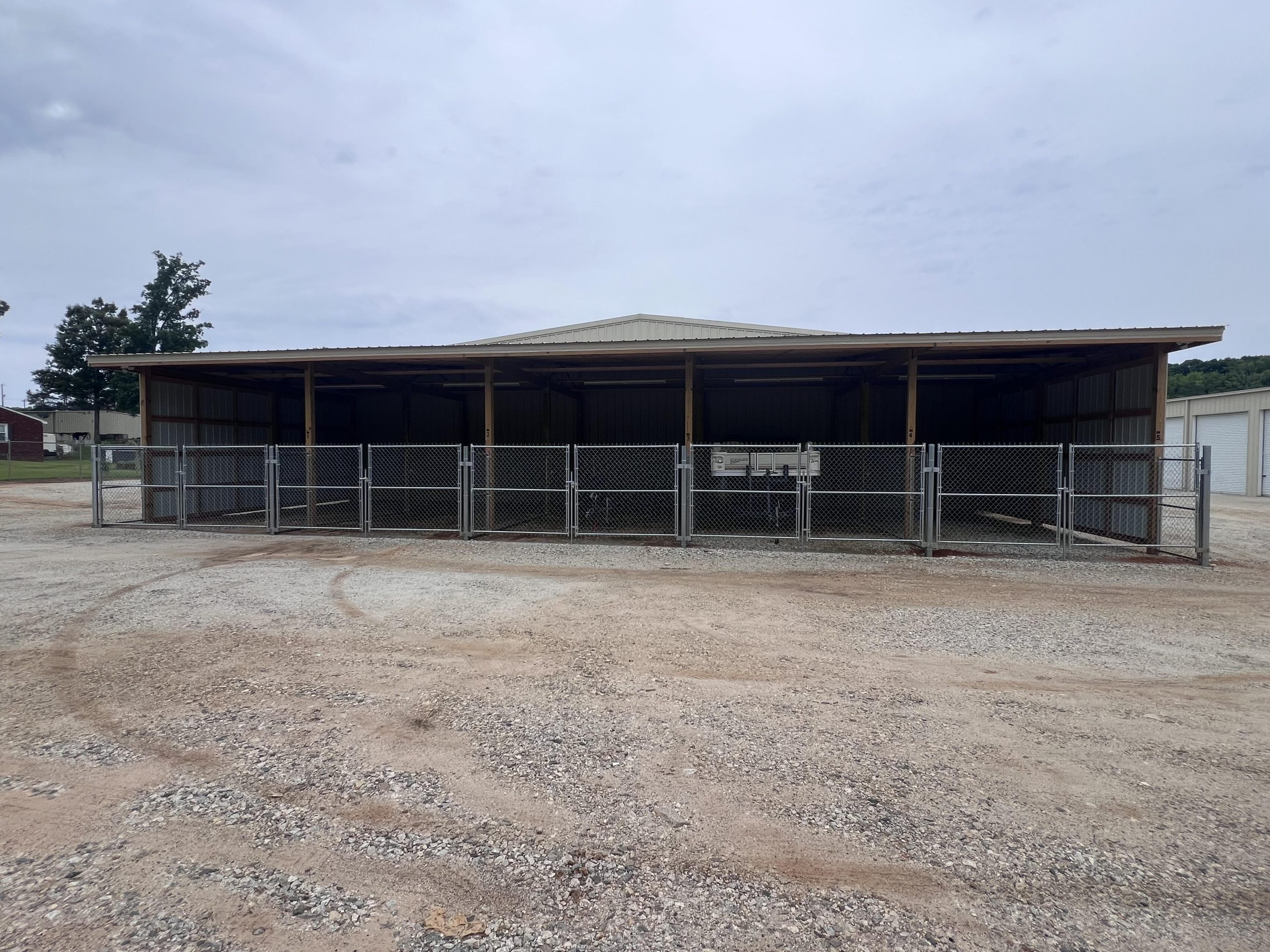 Open covered boat storage units showing spacious depth and weather protection